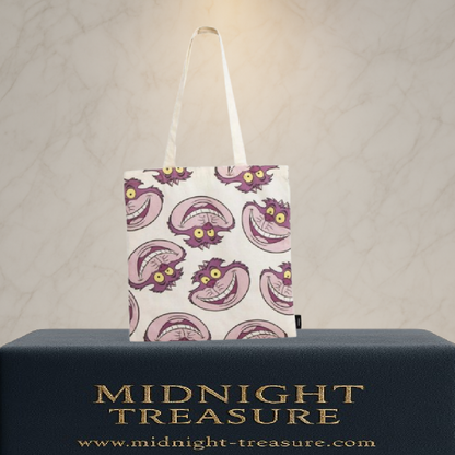 Tote bag Alice au pays des merveilles Chat du Cheshire avec motif répété. Sac en polyester et coton 36 x 39 cm, pratique et stylé pour fans de Disney.