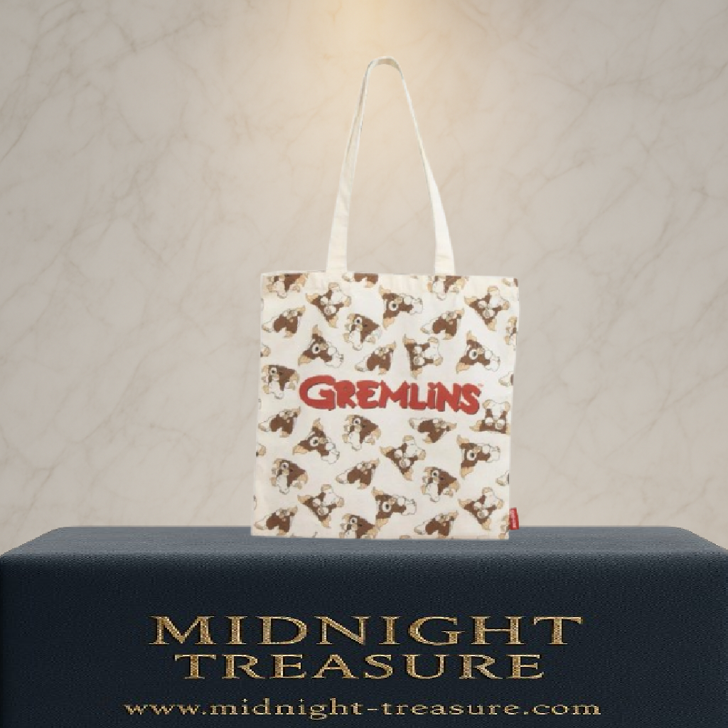 Tote bag Gremlins avec motif Gizmo répété et logo Gremlins rouge. Sac en polyester et coton de 36 x 39 cm, inspiré du film culte Gremlins, idéal pour un usage quotidien.