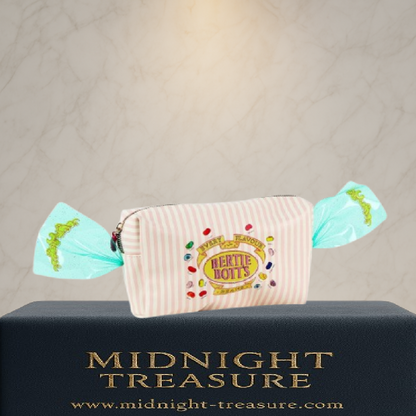 Trousse de voyage Harry Potter – Honeydukes – Bertie Bott’s – 20 x 11,3 x 7 cm. Trousse pastel façon bonbon avec dragées surprises et finitions translucides.
