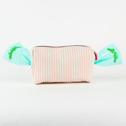 Trousse de voyage Harry Potter – Honeydukes – Bertie Bott’s – 20 x 11,3 x 7 cm. Trousse pastel façon bonbon avec dragées surprises et finitions translucides.